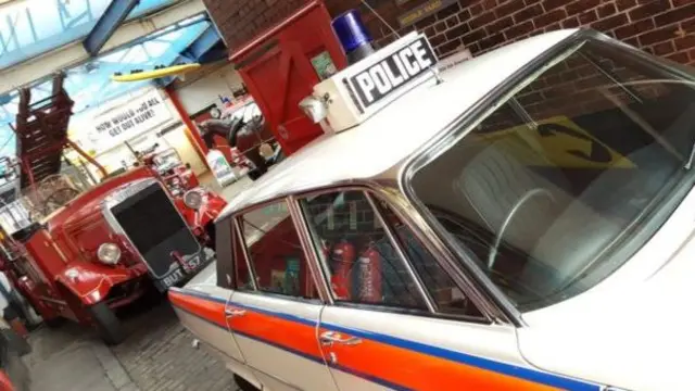 Police car and fire engine in museum