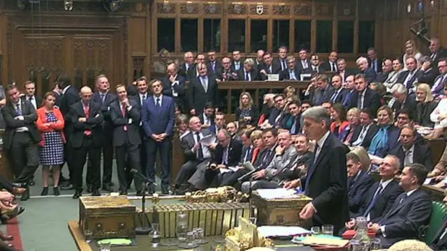 MPs look on as Mr Hammond delivers his first big Commons speech as chancellor