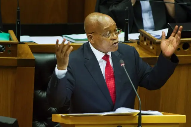 South African President Jacob Zuma answers questions during a session of questions to the president at the South African Parliament in Cape Town on November 23, 2016