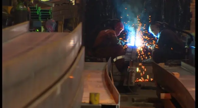 Steelworkers working