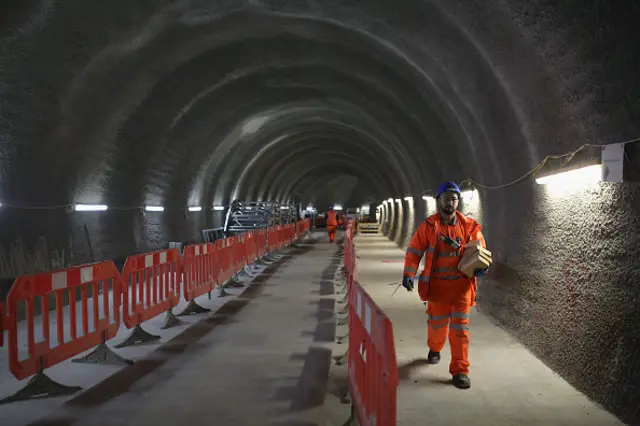 Construction workers continue to build the Crossrail underground line at Tottenham Court Road Station