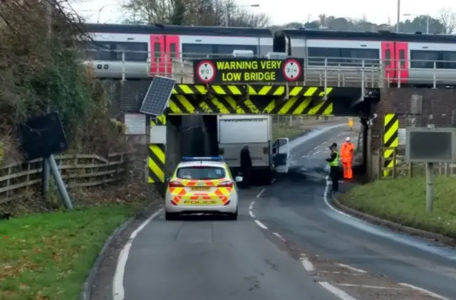 Van stuck under bridge in Ely