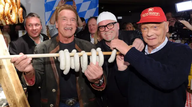 Arnold Schwarzenegger (left) and Niki Lauda (right)