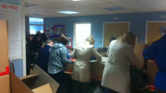 People packing food boxes