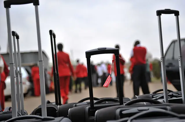 kenya airways staff and bags