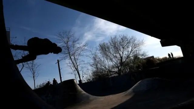 Skateboarder on ramp