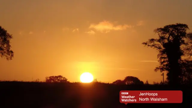 Sunrise over rural landscape