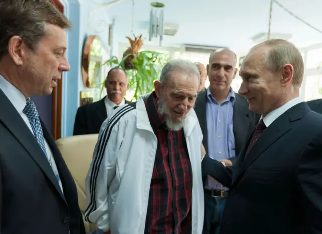 Russian President Vladimir Putin (R) meets Fidel Castro in 2014