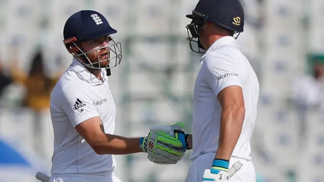 Jonny Bairstow and Ben Stokes celebrate their 50 partnership