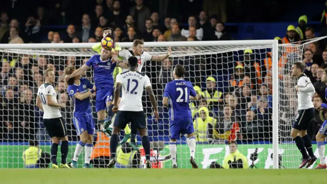 Gary Cahill heads clear