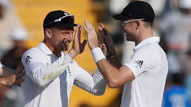 Jos Buttler celebrates with James Anderson