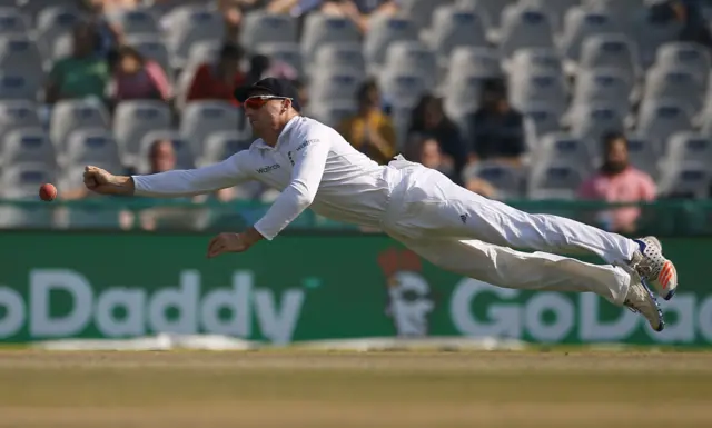 Jos Buttler dives trying to make a catch