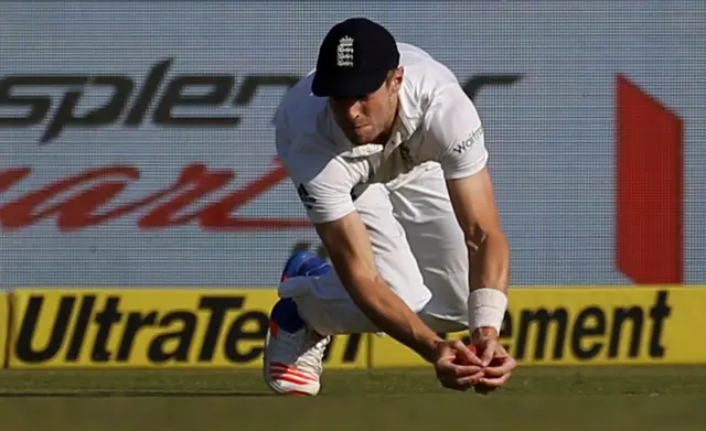 Chris Woakes makes a diving catch