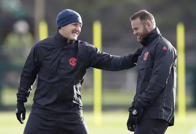 Bastian Schweinsteiger and Wayne Rooney