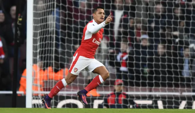 Alexis Sanchez celebrates