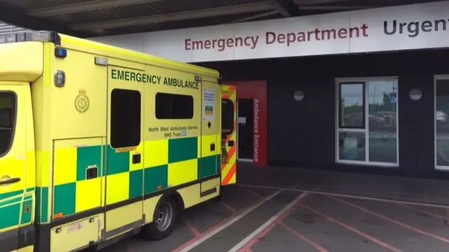 Leighton Hospital's accident and emergency entrance with ambulance