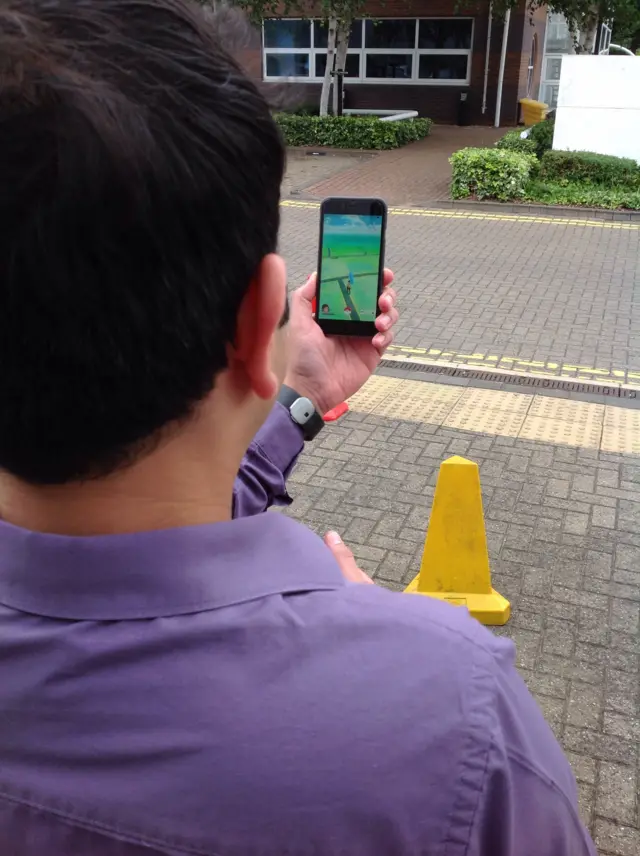 Man playing Pokemon Go