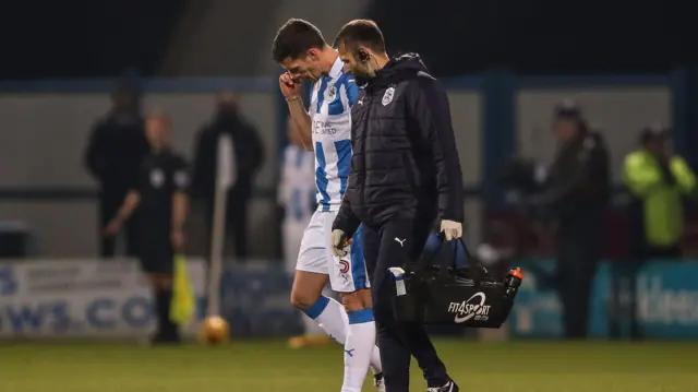 Mark Hudson limps off