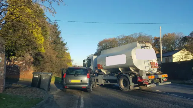 Two vehicles in collision