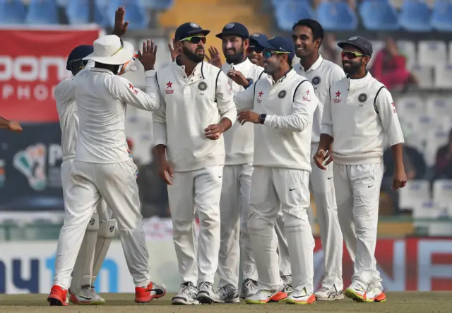 Indian cricketers celebrate