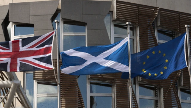 Union flag, saltire and EU flag