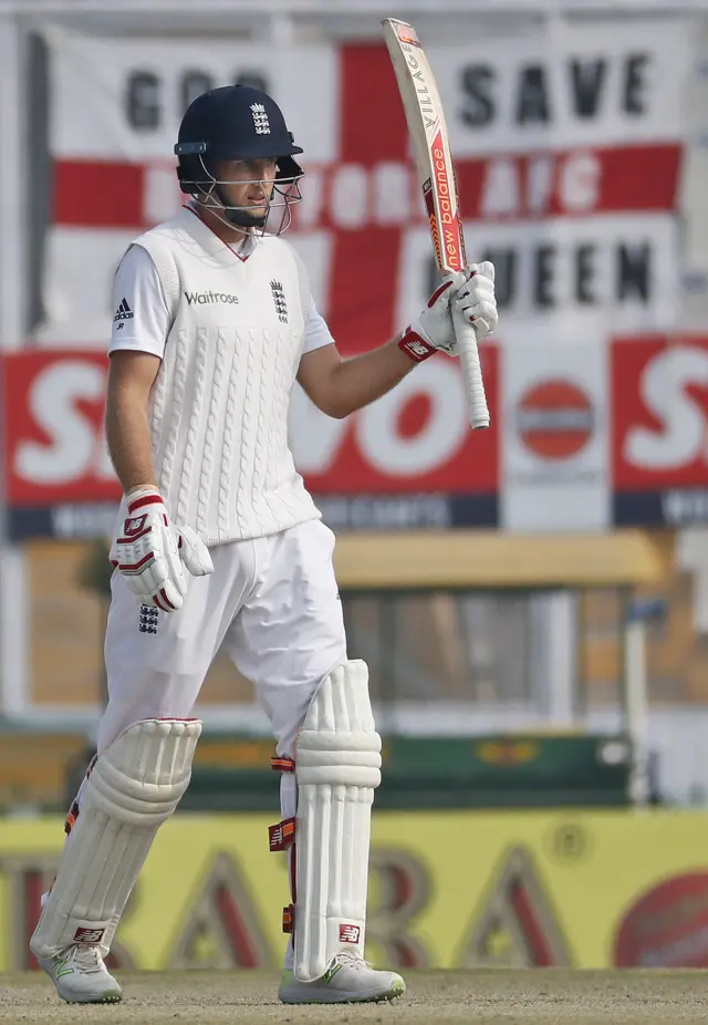 Joe Root raises his bat