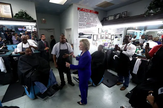 Clinton met voters at a barbershop in Las Vegas on Wednesday