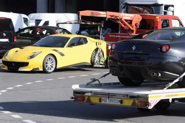 Ferrari and Porsche get towed