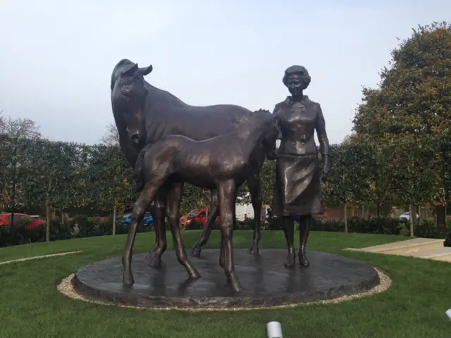 Statue of Queen with foal and mare