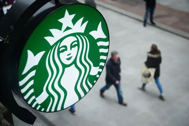 The Starbucks logo is pictured outside a branch of the coffee shop chain in Dublin