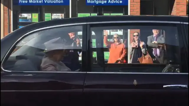 Queen in car