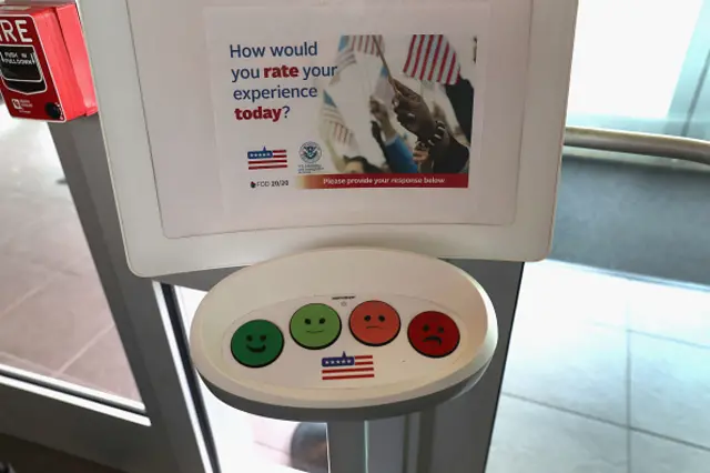 A happiness response monitor awaits immigrants departing the U.S. Citizenship and Immigration Services (USCIS), Dallas Field Office on August 22, 2016 in Irving, Texas.