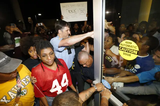 Protesters at New Orleans debate