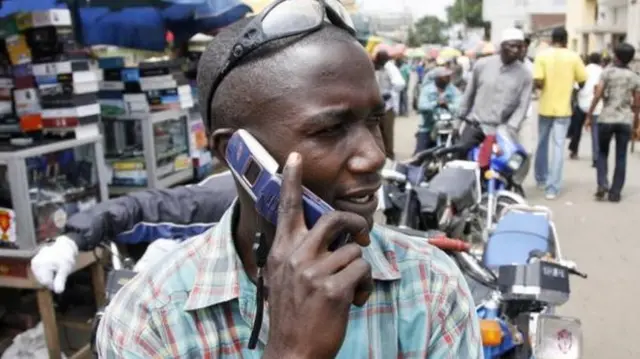 Man with mobile phone in NIgeriia