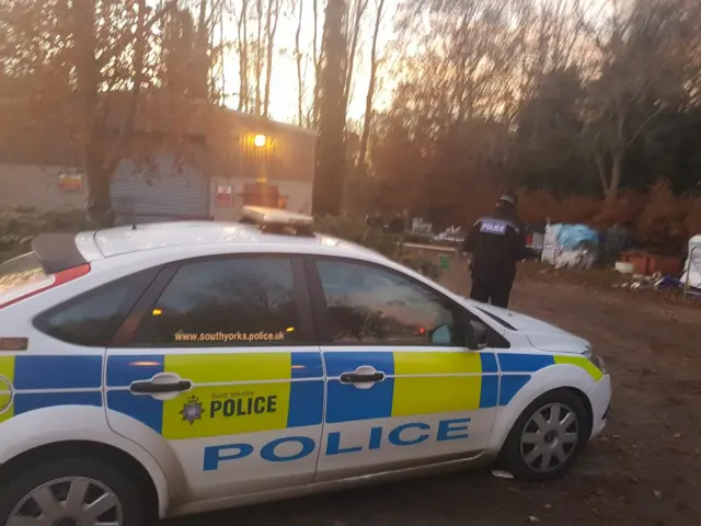 Police at sewage tank