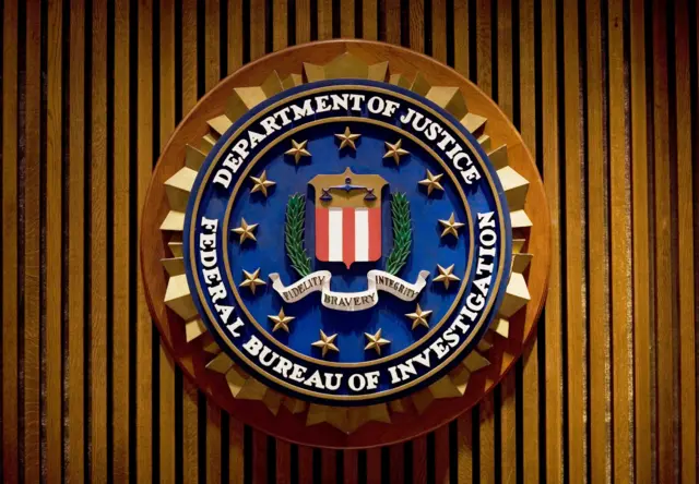 This August 3, 2007 file photo shows a crest of the Federal Bureau of Investigation inside the J. Edgar Hoover FBI Building in Washington, DC.