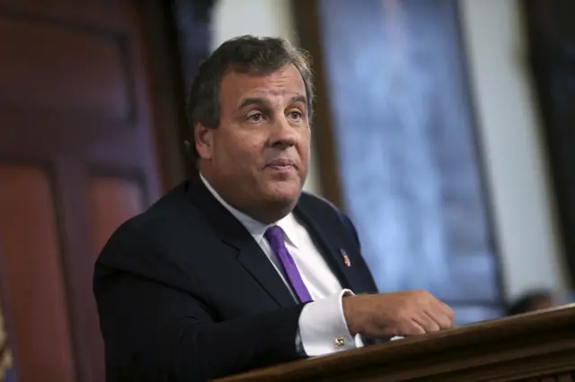 Chris Christie listens to a question from the media in Trenton, New Jersey.