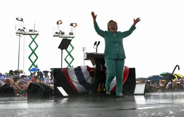 Hillary Clinton on stage in the rain during a campaign rally in Pembroke Pines, Florida - 5 November 2016