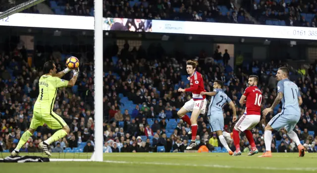 Marten de Roon scores