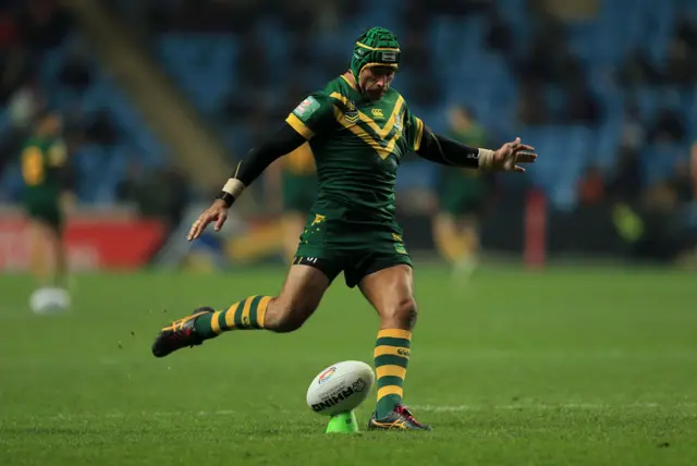 Johnathan Thurston of Australia converts a try