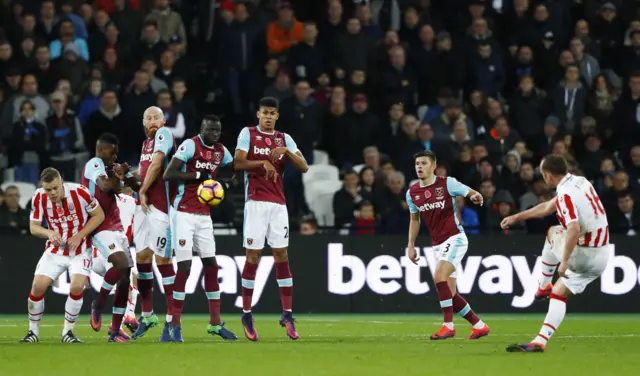 Charlie Adams takes a free kick