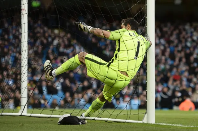 Claudio Bravo falls into the net