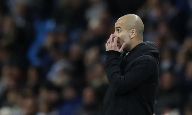 Pep Guardiola looks dejected