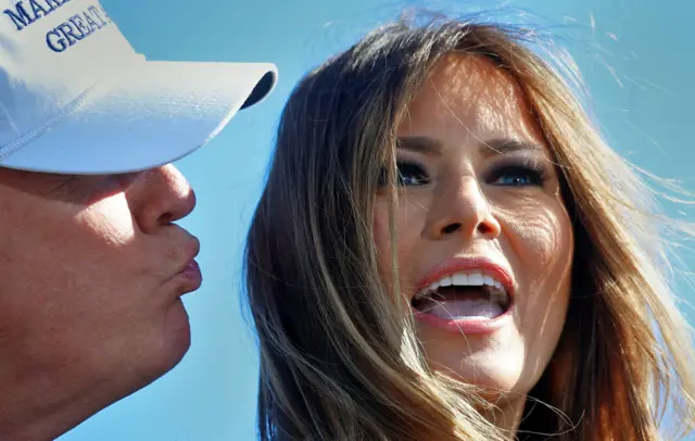 Donald Trump kisses his wife Melania Trump at a campaign rally in Wilmington, North Carolina - 5 November 2016