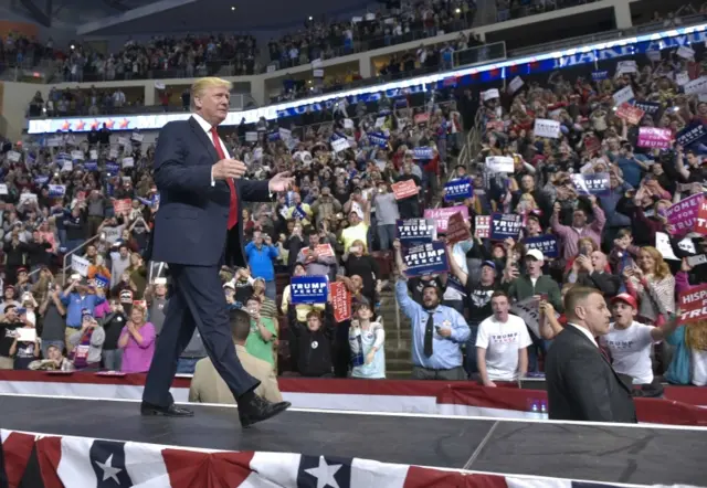 Republican presidential nominee Donald Trump arrives for a rally at the Giant Center in Hershey, Pennsylvania on November 4, 2016.