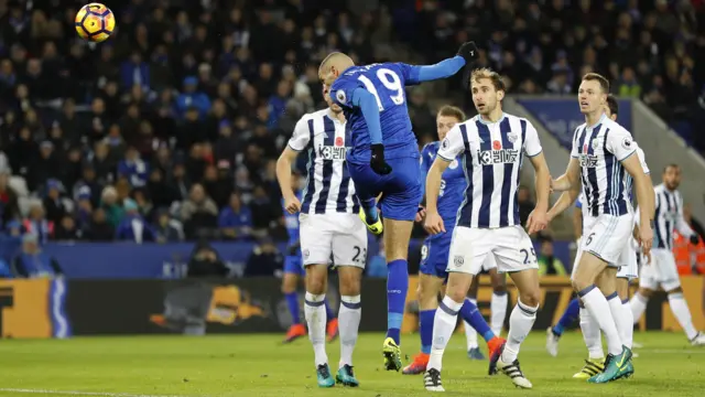 Islam Slimani scores