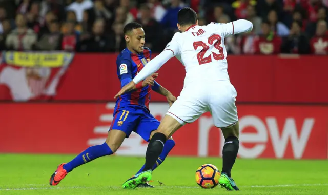 Adil Rami fouls Neymar