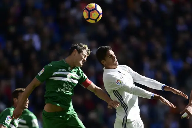 Raphael Varane of Real Madrid with Leganes' Bustinza