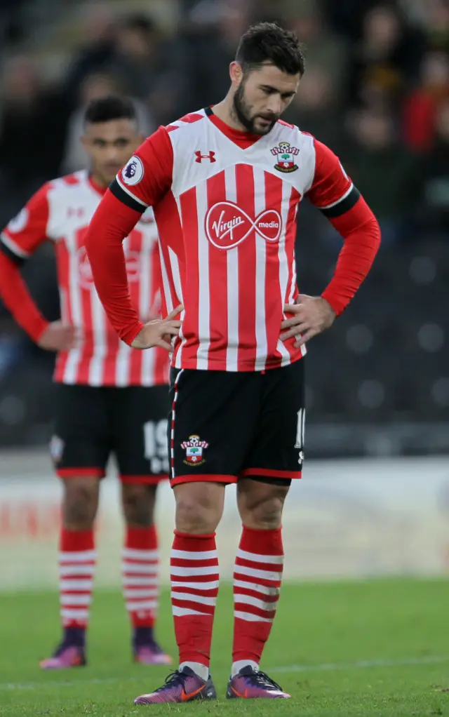 Charlie Austin looks dejected