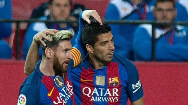 Lionel Messi and Luis Suarez